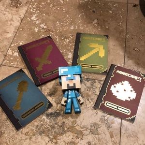 Four new (4) Minecraft Books and vinyl Steve figure